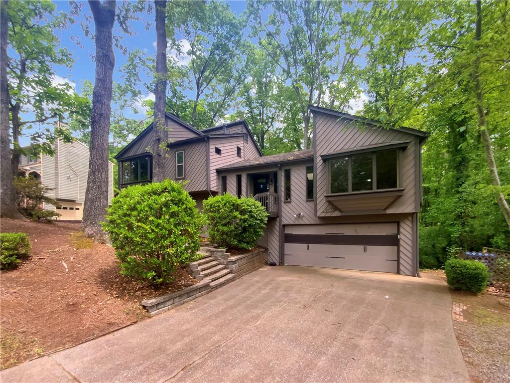 100-Day Home Warranty coverage available at closing. Welcome to this beautiful 4-bedroom, 2.5-bath Marietta home that's ready for your personal touches! Warm hard flooring flows throughout the living room, where you'll find a fireplace and a soft neutral color palette. Step into the kitchen to see stone counters, stainless appliances, and a stylish backsplash. The primary bedroom comes complete with an en suite bath and plenty of storage. Relax in the fenced-in back yard, where you'll find an inviting deck. Make this stunning home yours today!