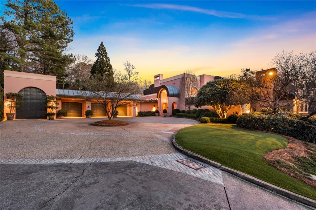 Rare, private 7.9 acre estate with hand applied hard coat stucco exterior & latest roof system. This residence was designed by Atlanta architect Henri Jova. Situated just 10 minutes north of Buckhead in a private neighborhood, Winterthur Estates. This is one of the finest examples of art deco style right down to the furnishings & light fixtures. Incredible quality and exceptional design. Mostly main floor living, walk out to pool and with spectacular views. Master on main w private garden. Elevator(2), generator, wine cellar, theater. Guest apartment. Greenhouse.