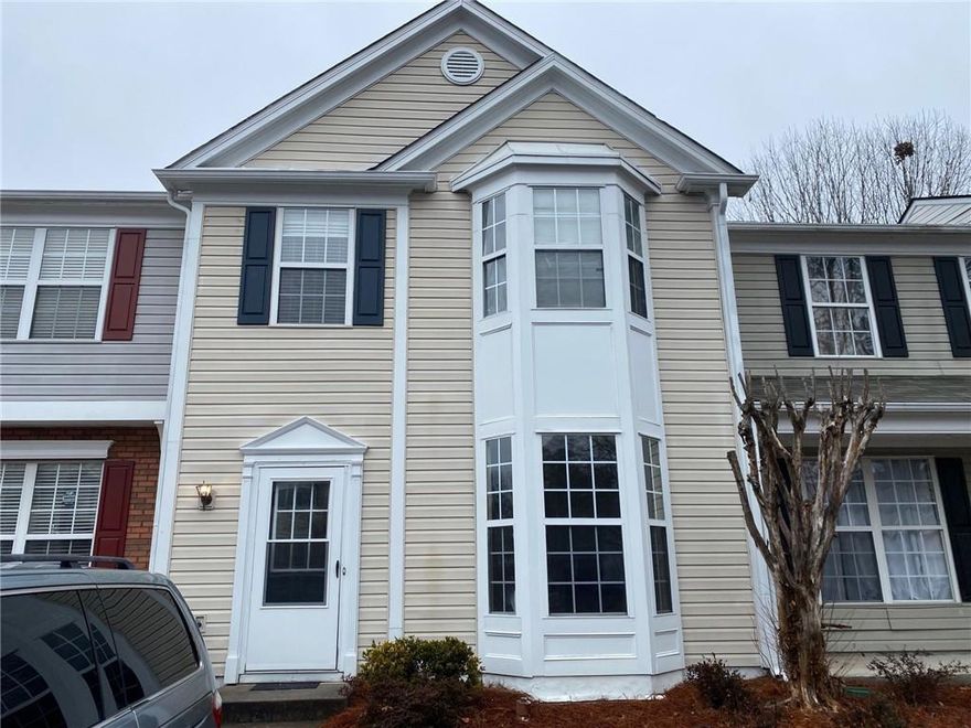 Great location! Great school area! Minutes away from GA 400 and Windward Parkway, this town home is tucked away in a well-maintained swim pool community. The unit comes with a refrigerator and washer/dryer so that you don't have to buy one! New Paint entire house, Pool in neighborhood. HOA includes pool, water , trash and landscaping. Text listing agent for showing the property. Vacant, Move-in ready. , owner is licensed real estate agent.