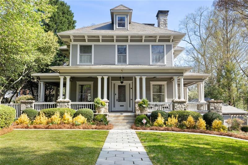 Welcome to 205 Peachtree Circle - this classic home, built in 1900, is one of Ansley Park's oldest and sits on one of the neighborhood's largest lots - well over an acre in the heart of Midtown Atlanta! The expansive wraparound front porch sets a sophisticated tone. The grand living room features stunning original hardwood floors -top nailed oak with an inlaid border, tall ceilings and a gorgeous fireplace. The living room flows seamlessly to a spacious dining room, which is also open to a chef's kitchen with state-of-the-art appliances and a keeping area overlooking the back porch and fantastic pool - an entertainer's paradise! A lovely wood paneled library with an original fireplace completes the main floor.Upstairs, discover four spacious bedrooms and three bathrooms, including an oversized primary suite with a fireplace and a generously sized his and hers bathroom. Ascend to the fourth floor where you will find an additional living space with a kitchenette, two bedrooms, and another full bathroom - perfect for guests! High ceilings and natural light abound in The terrace level, which offers a pool table area, another kitchenette, a workout room, a full bath, and a theater room The backyard boasts a beautiful Koi pond, mature landscaping, a luxurious pool, and expansive lawn space. At the rear of the lot, an adorable two story guest house awaits - replete with a full bed and bath, kitchenette, living area, and a half bath. A three-car garage and ample additional parking differentiate this home from most others in Ansley Park - truly an estate setting! This Ansley Park masterpiece is an opportunity not to be missed! It is within walking distance of fine dining, shopping, Piedmont Park and the Atlanta Botanical Gardens, the Beltline, Woodruff Arts Center and the High Museum of Art, Colony Square and all that Ansley Park and Midtown Atlanta offer. This spectacular home is ready for your personal touch-make it yours today!