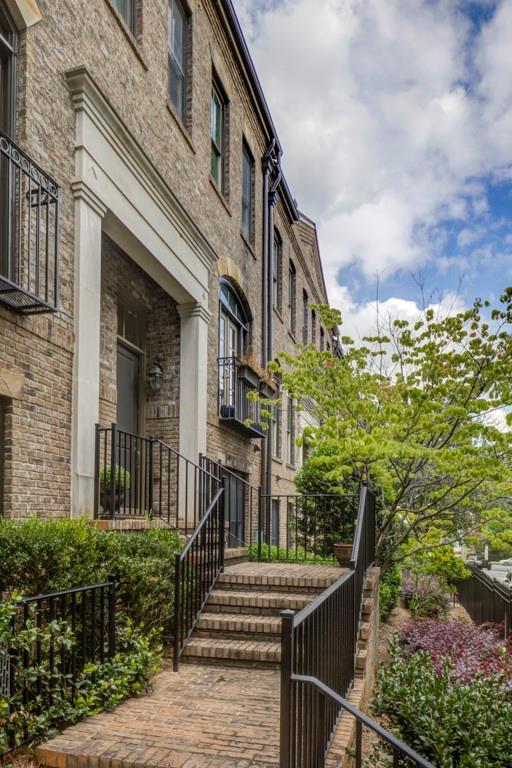 BEST unit in the BROWNSTONES AT HABERSHAM!! Move in ready! Conveniently located in the Heart of Buckhead. Enjoy the vibrant culture and upscale amenities that define this prestigious neighborhood. Close to nearby dining, luxury shopping, and the serene beauty of Chastain Park. Step into this timeless 3 bedroom, 3.5 bath townhome offering classic charm and modern sophistication. Enjoy entertaining with this open concept main floor living. Fully refinished hardwood floors throughout. Kitchen has been fully updated with marble countertops, tile backsplash, painted cabinets with new hardware and top-of-the line stainless steel appliances. Bright and airy with fresh paint throughout! Offering brand new designer light fixtures in all rooms. Oversized primary bedroom with dual vanity, soaking tub, shower, and large walk-in closet featuring built-in storage. The community is fully gated with low HOA fees. A great place to call home in Atlanta!