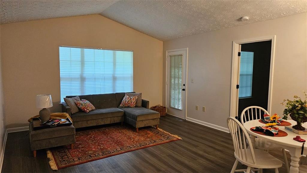 Well maintained 1 bedroom condo located in gated community. New LVP flooring and paint. The condo is very spacious with oversized master bedroom, nice size walk in closet, plenty of cabinets and storage, vaulted great room and private balcony facing the woods. Water heater and HVAC are newer. All appliances stay with the property. The community offers pool, club house & fitness center.