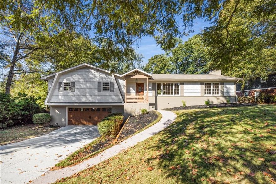 Welcome to 3465 Staci Court, a beautifully renovated mid-century ranch conveniently located in East Cobb’s highly sought-after Lassiter High School district. This home offers the ideal blend of modern design, open living spaces, and timeless character, all set on a quiet cul-de-sac street. Step inside to discover a bright, open floor plan where the brand-new chef’s kitchen features a large center island, stainless appliances, and sleek finishes that flow seamlessly into the dining area and the spacious family room. The show-stopping living space boasts soaring vaulted ceilings with exposed beams, fireplace and brick feature wall, creating the perfect setting for entertaining or relaxing by the fire. adjacent to the main living area is a versatile sunroom or home office. Enjoy outdoor living at its best on the expansive screened porch with vaulted ceilings or the new grilling deck overlooking the large, fenced backyard, ready for family gatherings, pets, and play. The main-level primary suite is a luxurious escape with an ensuite bathroom, complete with double vanities and a walk-in tiled shower. Two additional bedrooms and a beautifully updated full bath complete the main level. Downstairs, the finished basement level offers endless possibilities whether it be a recreation room, music/media lounge, or man cave, plus additional storage and access to the oversized two-car garage. This home truly has it all, style, space, and a prime East Cobb location close to parks, shopping, and top-rated schools.