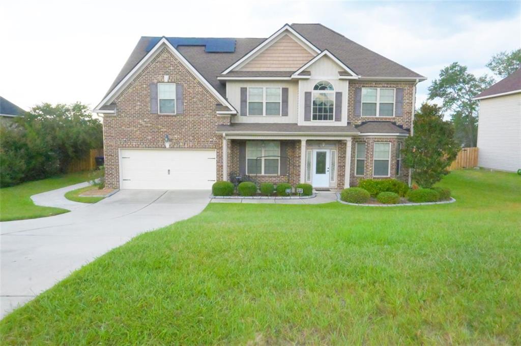 This home is packed with value. Super spacious 5 bedroom and 3 full baths featuring solar panels, a newer roof, and a sunroom. This home offers timeless comfort in a desirable neighborhood. From the moment you walk in, you'll feel the warmth and care that went into this gem. Bright open concept with a granite island in the kitchen gives a true flow through the main living areas. The Family dining is perfect for gatherings and if you're looking for even more entertainment space you can check out the huge family room. The primary suite is what some may call enormous, it is complete with it's own sitting area, fireplace, and reading nook. Fenced backyard with tons of space for pets, play, or future additions. Convenience is at your doorstep with Fort Gordon only 15 minutes away, easy access to shopping, food, entertainment, and Diamond Lakes Regional Park is also nearby. This is the special one you have been waiting for!