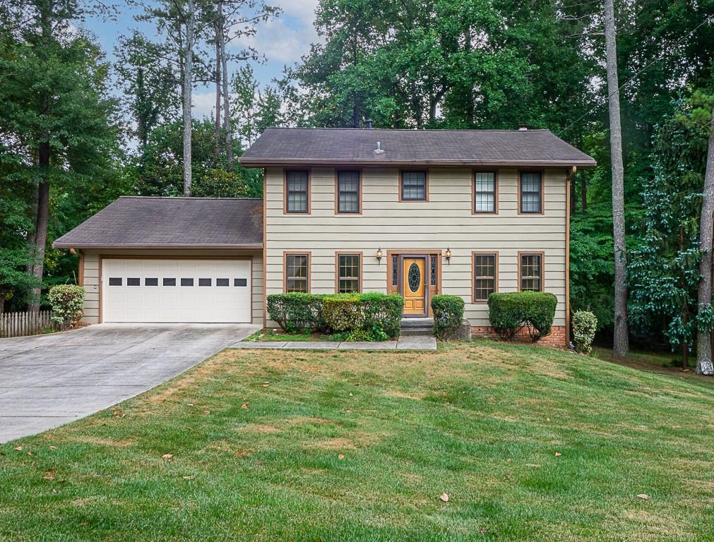 Don't miss this lovely traditional home on a great lot in coveted Mountain Creek!  This beautiful home has a great layout with sightlines from kitchen to living room, and a previous sunroom addition as an extension of living space--perfect for entertaining or spreading out!  Separate dining room and formal living room makes a fantastic office.  Upstairs, bedrooms are generously sized and primary suite had a previous bathroom renovation.  The basement offers even more space for however you might need it, as well as unfinished storage.  Backyard has a fenced portion and is a great size.  This home has been well cared for and is ready for it's next owners to make it their own!  Amazing location with Roswell address and Cobb taxes and schools, nearby shopping, schools, trails and more--5 minutes from historic Roswell and easy to access anywhere in East Cobb, as well!