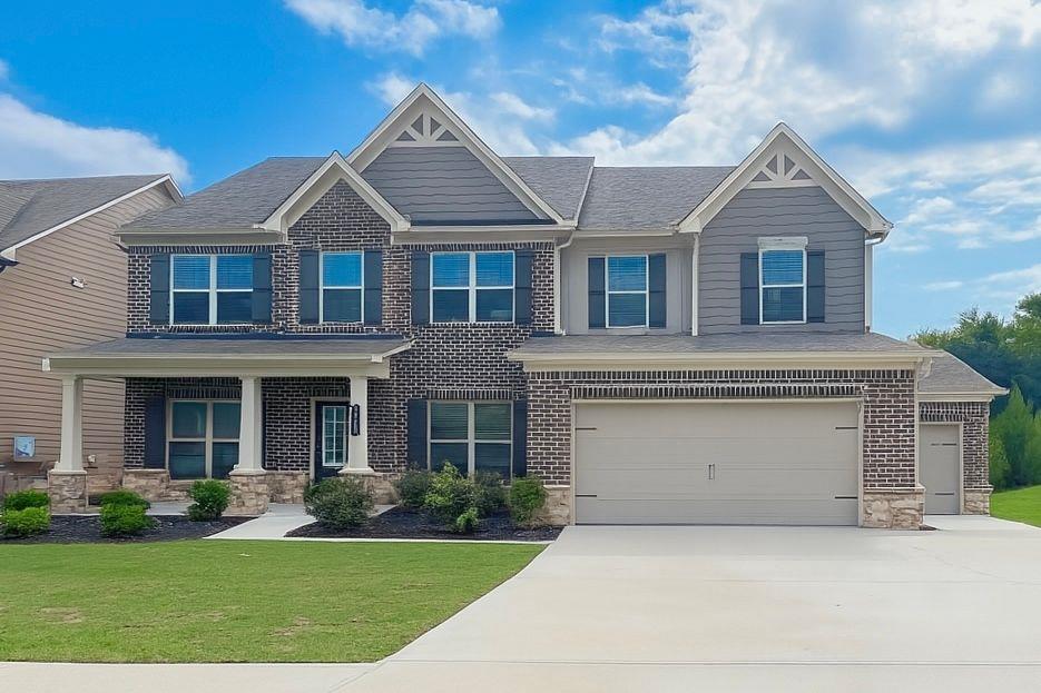 Welcome to this stunning five-bedroom, three-bathroom home that features a bright and open floor plan with plenty of space for comfortable living and entertaining. The main level includes a spacious kitchen with granite countertops, stainless steel appliances, abundant cabinet storage, a large center island, and a sunny breakfast area. A separate dining room adds a touch of elegance for formal meals, while a versatile flex room offers the perfect space for a home office or study. Additionally, there is a guest bedroom on the main floor with a full bathroom. Upstairs, you will find four generously sized bedrooms and a secondary family room that provides extra space for relaxation or play. The oversized owner's suite features a cozy sitting area and a luxurious spa-inspired bathroom with a double vanity, soaking tub, walk-in shower, and a spacious walk-in closet. The three secondary bedrooms share a well-appointed full bathroom. A convenient laundry room is also located on the upper level. Step outside to enjoy the large backyard, ideal for outdoor gatherings or quiet evenings. This home is located in a desirable community with access to swim and tennis facilities, a playground, and it falls within a top-rated school district. You will also enjoy easy access to Highway 316, along with nearby shopping, dining, and parks. Do not miss the opportunity to make this beautiful home yours. Schedule a showing today and experience all it has to offer. Welcome home!