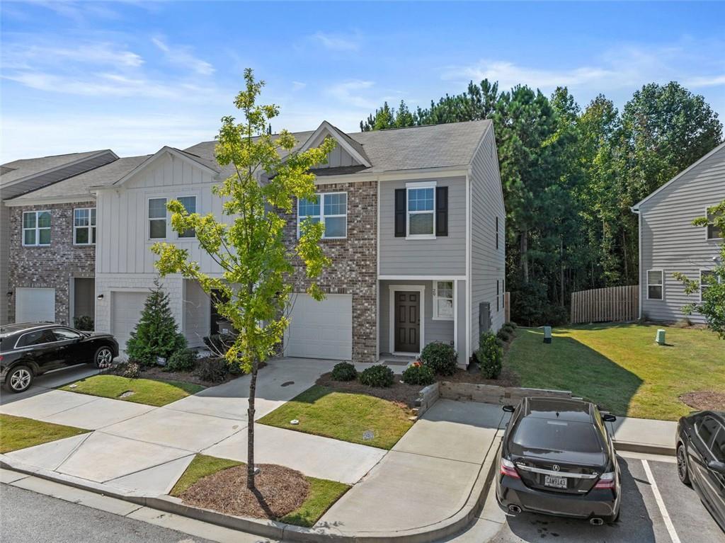 Desirable end unit in Rivington Walk subdivision! Come see this beauty for yourself today! Very clean and well maintained this home is move in ready, with upgrades to this already beautiful townhome, tiled backsplash and shiplap accent wall in the kitchen adding an elegant touch. The home offers 3 spacious bedrooms 2 and 1 half baths with a cute and private backyard you can enjoy your morning coffee. This end unit offers plenty of parking just off the side of the home and in a cul-de-sac to the left of the home you have lots of space for entertaining as well. Home is close to everything, Barrow Crossing shopping area, food, shopping and so much more! Urgent Care nearly, close to Highway 316, right in between Bethlehem, Winder and Monroe this area is booming!