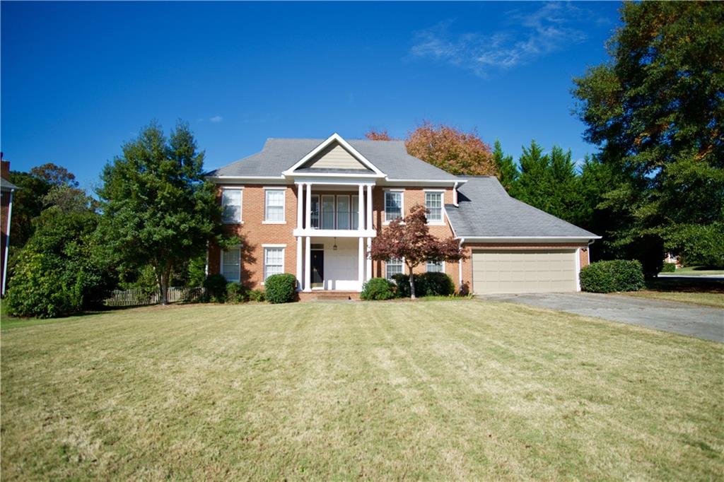 Nestled on a quiet cul-de-sac in Dunwoody, this traditional 4-bedroom, 2.5-bath home offers comfort, style, and plenty of space to spread out.
The welcoming two-story foyer features hardwood flooring and an exposed second-floor hallway, adding character and natural light throughout the main level. Enjoy both formal living and dining rooms, with an elegant fireplace anchoring the main living space. The eat-in kitchen includes granite countertops, a built-in oven, and stainless steel refrigerator—perfect for everyday cooking or casual dining.
Each bedroom offers ample space, and the primary suite includes a large walk-in closet with a skylight, plus a spacious en-suite bath with a separate shower and garden tub.
Step out onto the expansive back deck overlooking a private, tree-lined backyard—ideal for relaxing or entertaining. A charming front balcony offers views of the peaceful cul-de-sac, and the home includes a two-car garage for added convenience.
Don't miss this inviting home in a well-established neighborhood with easy access to shops, dining, and major commuter routes.