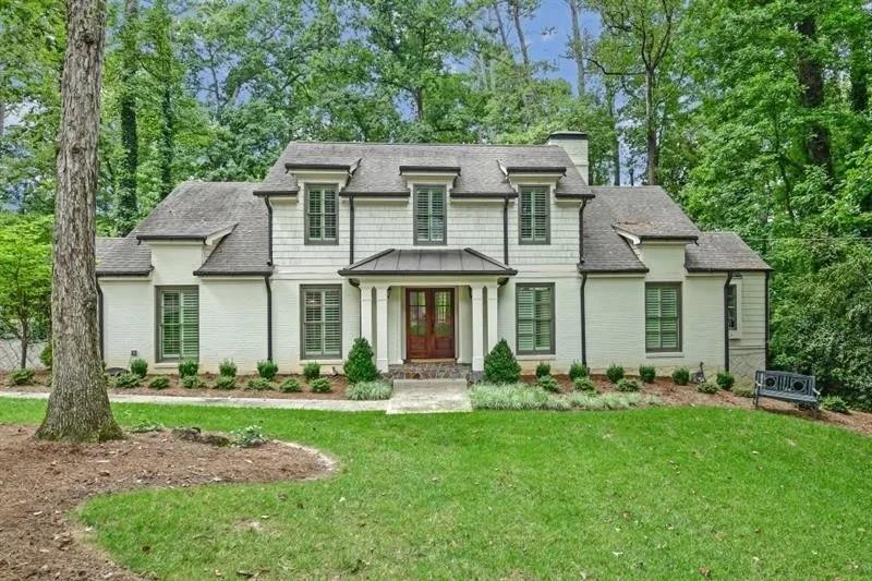 Welcome to this fabulous, fully renovated 5-bedroom, 5 1/2-bath home in the highly sought-after North Buckhead neighborhood, a stunning blend of comfort and style. Nestled in this beautiful vibrant neighborhood in one of the best areas of town. Offering easy access to top rated schools, trendy dining options and lush parks. A stone throw away from 400. Prepare to be impressed upon entry, you'll find a spacious and inviting layout with 5 bedrooms and 5 1/2 bathrooms perfect for unwinding and entertaining. Recently upgraded fixtures and appliances add a touch of luxury to your daily routine. The main level features a spacious primary suite with a walk-in closet and a luxurious bath. Featuring a fabulous chef's kitchen overlooking the family room. Wonderful breakfast room which boasts its own fireplace and French doors leading to the deck. The dining room is quite large, a formal living room with a stunning wall of built-ins. . Upstairs, you'll find three spacious bedrooms, 2 bathrooms both with walk-in closets. Step down to the terrace level where you will find another bedroom, two more full baths, a wonderful kitchenette and tons of storage. This place really is stunning. Make this your next home, call Susie for a private showing.