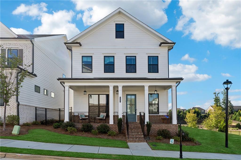 ***OFFERING 3.99% APR WITH PREFERRED LENDER***
!!!!DON'T MISS THE AMENITIES THE COMMUNITY IS OFFERING!!! NO RENTAL RESTRICTIONS
Welcome home to 1481 Buice Crest Dr — a stunning 2023-built, move-in ready courtyard home in the desirable Millcroft community.
Step inside to discover 10-ft ceilings on the main level and beautiful hard surface flooring flowing throughout the the main living areas. The gourmet kitchen boasts stacked white cabinetry, a midnight stained island, quartz countertops, tile backsplash, stainless appliances, and a single-bowl sink.
A guest suite with full bath on the main level offers convenient accommodation for visitors or guests. Upstairs, the oversized owner’s suite features dual vanities, a soaking tub, walk-in shower, and a spacious walk-in closet. Secondary bedrooms share a well-appointed hall bath, and the upstairs loft adds flexible living space. The laundry room is centrally located for ease.
Outside, enjoy the private courtyard, rear-entry garage, and a balcony off the master suite. The home’s exterior showcases cement siding with a brick watertable, and the well-maintained lot gives you both curb appeal and privacy.
Millcroft’s community amenities (pool, sidewalks, green spaces) and its proximity to top-rated Gwinnett schools, shopping, and dining make this home a standout.
Details at a glance
4 bedrooms / 3 full bathrooms
~2,530 sq ft living space
Built in 2023 - CLOSED in 2024
Rear-entry 2-car garage
HOA fees ~$185/month
Convenient to Sugar Hill Elementary, Lanier Middle & Lanier High
Don’t miss your chance on this exceptionally designed and beautifully finished home in Buford’s thriving community. Schedule your tour today!