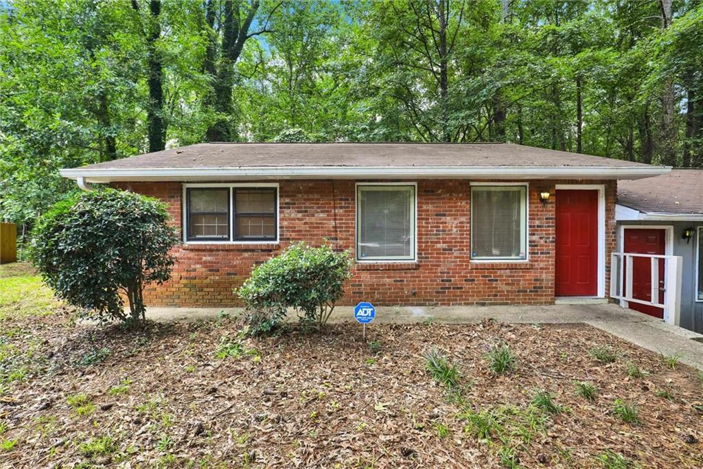 Welcome to 4371 Springwood Terrace, a comfortable 2-bedroom, 1-bathroom single-level home in a peaceful, tree-lined neighborhood. This property is the left side of a duplex-style single-family home, giving you the feel of private living with the benefit of low-maintenance convenience. Inside, you’ll find a bright living room with plenty of natural light, a spacious eat-in kitchen with ample cabinet storage, and two well-sized bedrooms. The bathroom connects directly to the primary bedroom and hallway, making it easily accessible for all. A laundry hook-up is included in the ensuite area, adding functionality to everyday living. The neighborhood offers a quiet residential setting while keeping you close to everything you need. Just minutes from Southlake Mall, Home Depot, Walmart, and everyday shopping and dining options, you’ll never be far from essentials. Outdoor enthusiasts will appreciate nearby Reeves Creek Trail and Independence Park, while commuters enjoy quick access to I-285, I-75, and I-85. Plus, the home is only about 15 minutes from Hartsfield–Jackson Atlanta International Airport, making travel simple. With its convenient location, single-floor living, and tranquil setting surrounded by trees, this home blends comfort, accessibility, and lifestyle amenities. The property is currently vacant and available to show, ready for its next residents to move in and enjoy.