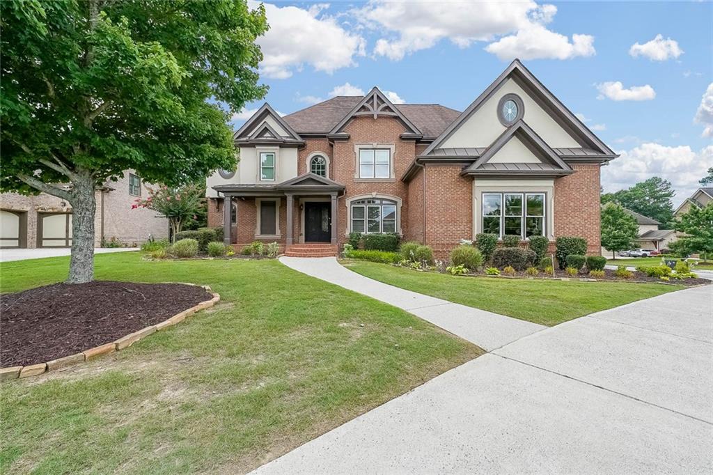 This beautifully refreshed home is located just 3 minutes from Mall of Georgia and only 3 miles from I-85 Exit 118, offering unbeatable access for commuting, shopping, and entertainment. Nestled in a high-end, well-maintained neighborhood known for its safety, walkability, and upscale ambiance, the community also offers exceptional amenities—including a swimming pool, tennis courts, basketball court, playground, and scenic walking areas.
The home features a timeless brick and stacked stone exterior. Inside, enjoy freshly painted interiors and brand-new hardwood flooring throughout. The gourmet kitchen boasts stone countertops, an oversized island, and refined moldings, flowing into a warm family room with a coffered ceiling and fireplace—perfect for both entertaining and relaxing.
A rare layout offers two owner’s suites—one on the main level and another upstairs—ideal for multigenerational living or guest privacy. The upstairs suite features double vanities, a walk-in closet, and a jetted tub with separate shower. Four additional bedrooms are connected via two Jack-and-Jill bathrooms for added convenience.
Laundry rooms are located on both the main and upper levels, with a washer and dryer included upstairs.
Minimum 12-month lease required; 24-month lease preferred. Strong credit (FICO 680+) and stable income (typically 2.5–3x the rent) required. All applicants are subject to full credit, income, and background verification.