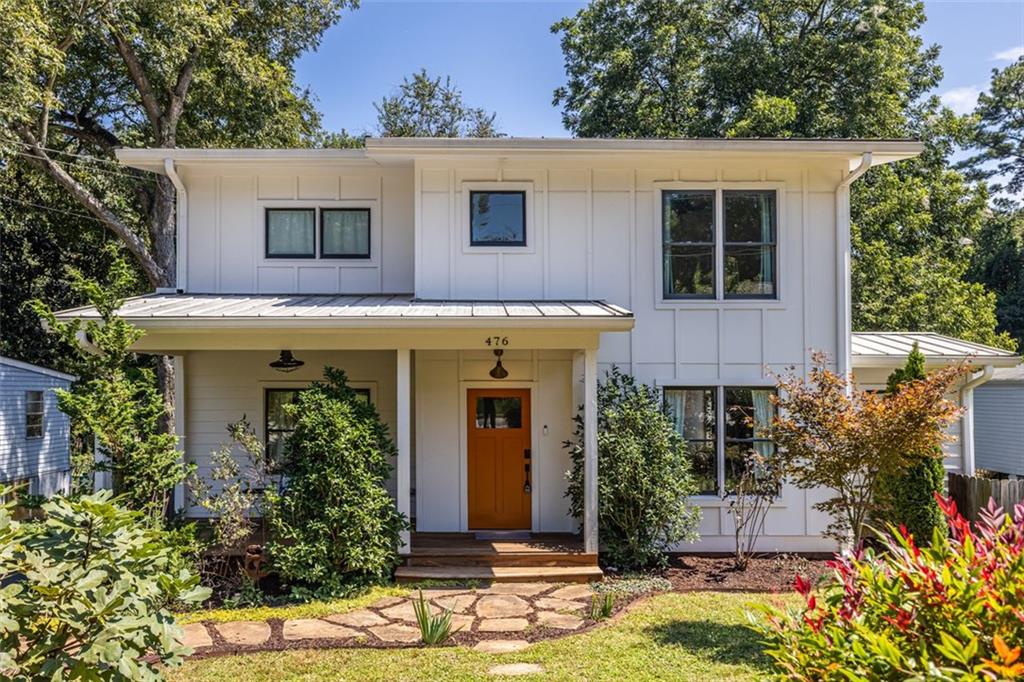 Farmhouse chic in the heart of East Atlanta! Welcome to 476 Maynard Terrace, where timeless 1948 character meets modern comfort. The inviting front porch sets the stage, leading into sunlit rooms with hardwood floors and a natural flow that makes both lively gatherings and quiet evenings feel right at home. The kitchen, thoughtfully updated, invites you to cook, create, and connect—with just the right balance of style and practicality. The first bedroom and bonus room sit on this main floor, great for an office or craft room--along with one full bath. Upstairs, retreat to spacious bedrooms and two full baths, including a serene primary suite featuring a spa-like shower and a walk-in closet, creating a private retreat that feels both functional and indulgent. Outside, the expansive backyard opens up endless possibilities: a lush garden, cozy firepit, or entertaining friends on the stylish back deck. With its classic metal roof and modern systems, this home is built to last while keeping its farmhouse feel. All of this, just minutes from the restaurants, shops, and energy of East Atlanta Village—giving you the rare mix of neighborhood charm and city convenience. AND, a huge BONUS? Located seconds to highly sought after Burgess Peterson Academy! Come see for yourself why this Eastside farmhouse is more than a house—it’s a place to call HOME.
