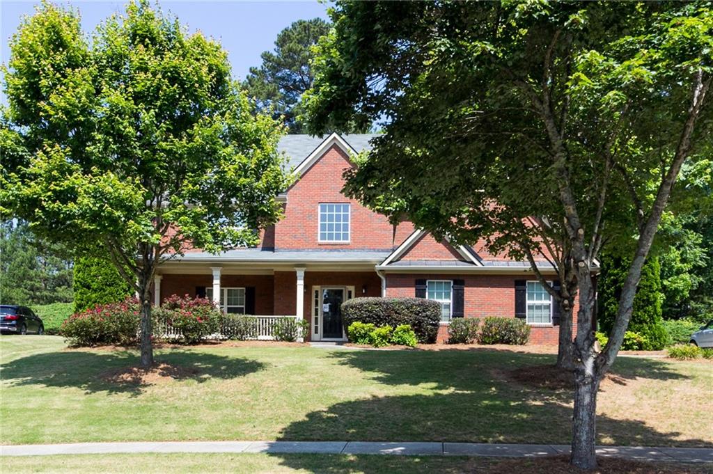 New carpeting throughout. One year home warranty. Security System in place. Beautiful 4 bedroom, 2 1/2 bath home in the sought after Woodlake neighborhood. 2 story hardwood foyer entry. Gourmet kitchen with loads of cabinets & counter space. Living room, Dining room, and Family room with gas starter in fireplace. Huge master with master bath, whirlpool tub, separate shower, oversized walk-in closet. Spacious secondary bedrooms. Roof was replaced in 2019. New all house paint 2012 and exterior touched up in 2019. In the Walnut Grove High School District. George Walton Academy also in the area. Sprinkler system in front yard. This neighborhood provides many great amenities as well, including everything from tennis, swimming, playing on playground, and even accessing the lake. Convenient to schools, shopping, restaurants, and entertainment.