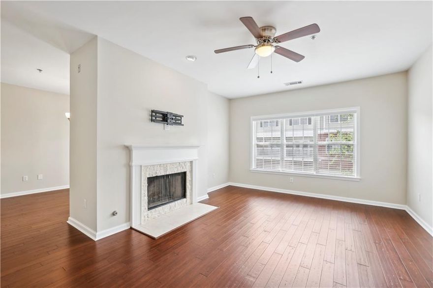 Don't miss this spacious home located in an unbeatable Alpharetta location!  Walkable to Avalon and Downtown Alpharetta, this 2 Bedroom, 2 1/2 Bath Condo is completely updated throughout.  Absolutely move-in ready!  This home includes a huge 2 car garage with plenty of storage and great parking just outside the front door.  Upstairs, there are two spacious bedrooms with wood floors and ensuite baths.  The main level features a fireplace, wood floors, and a deck.  You will enjoy cooking in the upgraded kitchen with lots of counter and cabinet space.  The neighborhood is gated and also features a pool.  Trash and water are included in the monthly rent!