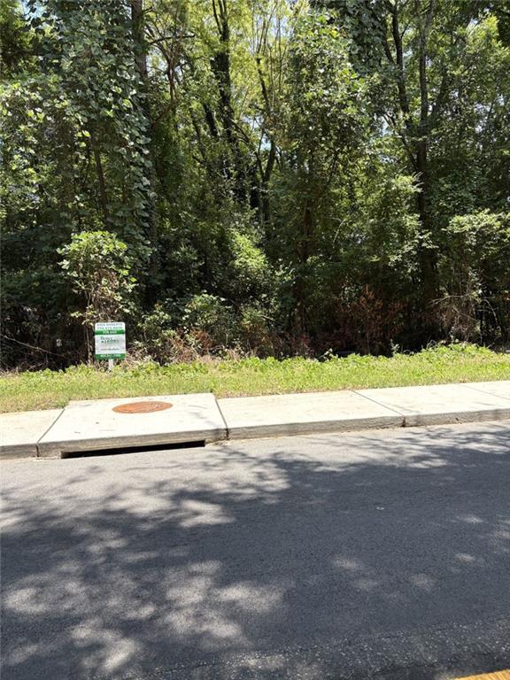 Unimproved land. Seller has 3 other lots he is willing to sell as a bundle.