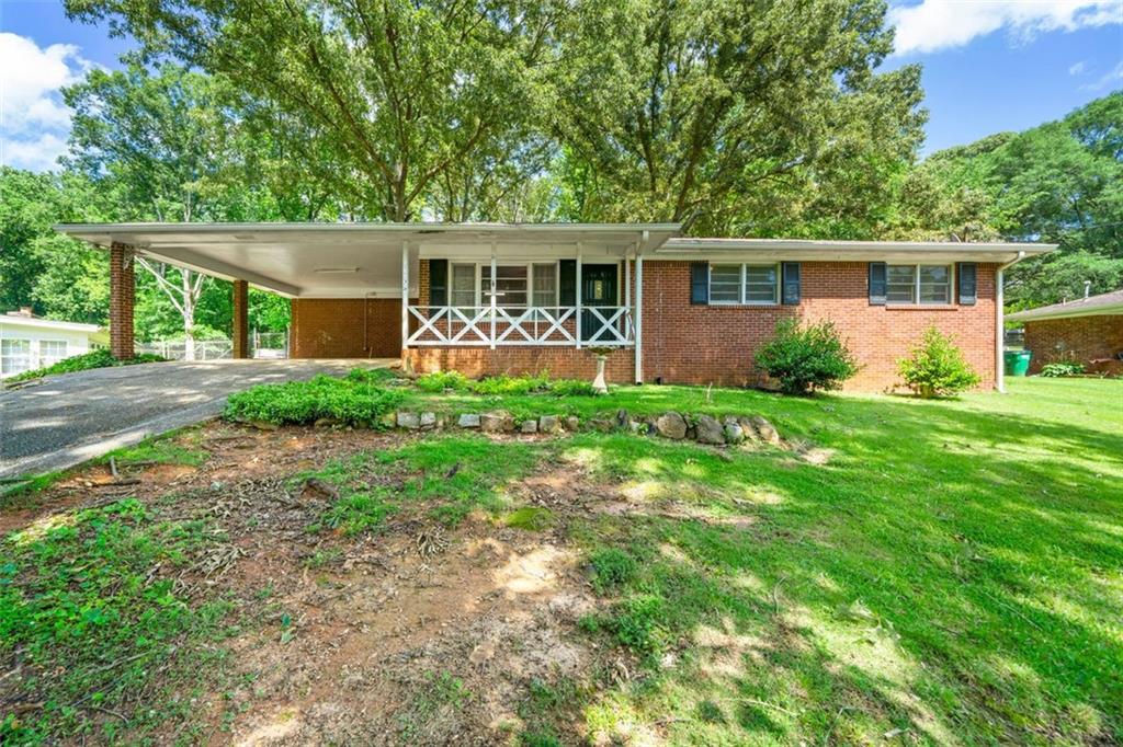 Introducing this Adorable ranch in the heart of Austell, Cobb county with NO HOA! This home features 3 bedrooms awaiting your finishing touches and 1 spacious bathroom. Step inside your living room to find an open concept into the kitchen featuring stainless steel appliances. Walk outside to find your large backyard, with plenty of space to reimagine and create your perfect space! The perfect opportunity to make this house a home with your own finishing touches! Reach out today!