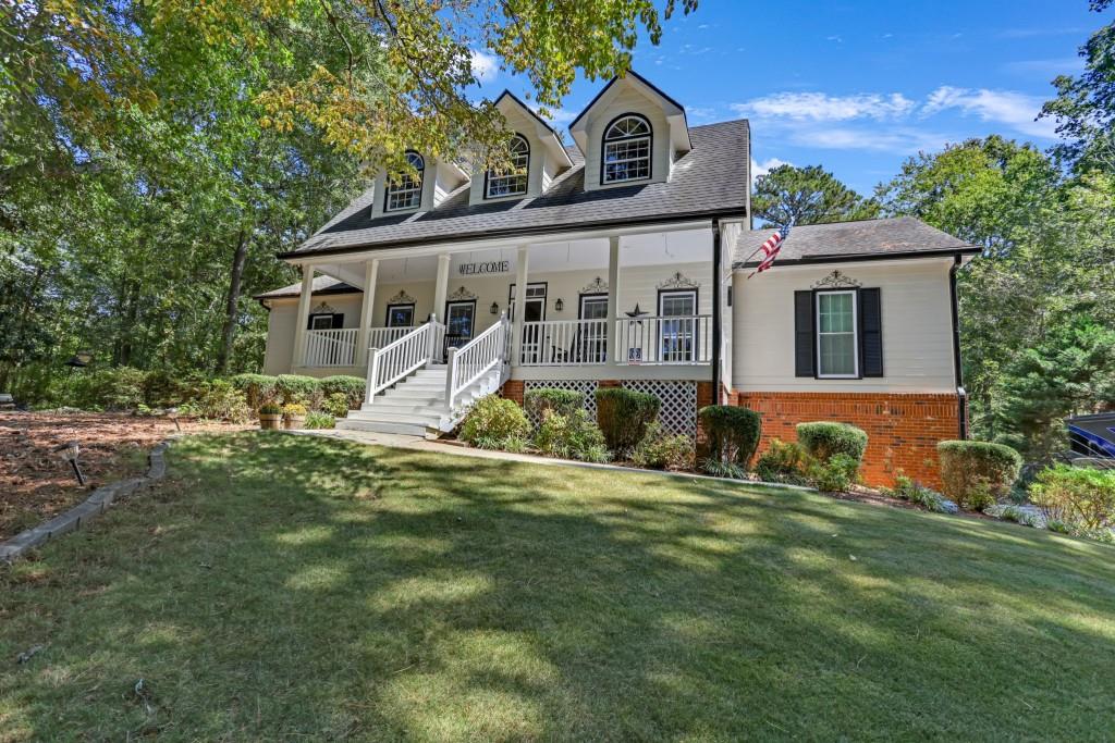 Custom Cape Cod 5BR/3BA on .62 acres in a cul-de-sac backing to Big Haynes Creek. Fresh interior & exterior paint, new insulated garage doors, and an in-ground pool with brand-new liner. 5+ car garage with workshop plus 50-amp service charger for 40-ft motorhome. Gourmet kitchen with vaulted ceiling, SS appliances, granite, double ovens, oak cabinets & Italian tile floors. Owner's suite on main with spa bath jetted tub, seamless glass shower & bronze fixtures. Large laundry room with sink , front & back covered porches, and storage galore. Too many extras to list - must see!