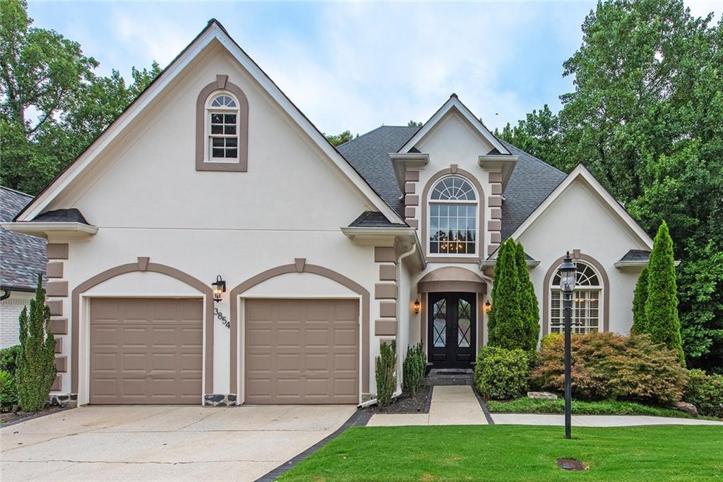 This meticulously maintained European-style home is quietly tucked away on a private cul-de-sac in one of Brookhaven’s most desirable neighborhoods. Freshly painted inside and out in designer neutral tones, the property is move-in ready and offers a rare combination of privacy, space, and convenience.
The main level features soaring ceilings, a light-filled layout, and an open-concept design ideal for everyday living or entertaining. The gourmet kitchen includes high-end appliances, granite and slate finishes, and rich maple cabinetry—flowing seamlessly into the living and dining areas. The spacious primary suite is a true retreat with a spa-like bath, beautifully remodeled to include modern finishes.
All bathrooms throughout the home have been thoughtfully updated, blending contemporary style with timeless design.
Downstairs, the terrace level offers a full second living space with its own private entrance and walkway. Complete with a second kitchen, great room, office, two bedrooms, a bonus room, and a full bath, it’s perfect for in-laws, teens, roommates, or short-term rental opportunities.
The expansive back deck overlooks a peaceful, wooded yard and is perfect for relaxing or hosting guests. Recent mechanical upgrades provide comfort and efficiency for years to come.
Set in a quiet community with sidewalks and minimal HOA, this home is just minutes from parks, premier shopping, top-rated Atlanta restaurants, and major conveniences—offering the perfect blend of nature and city access.