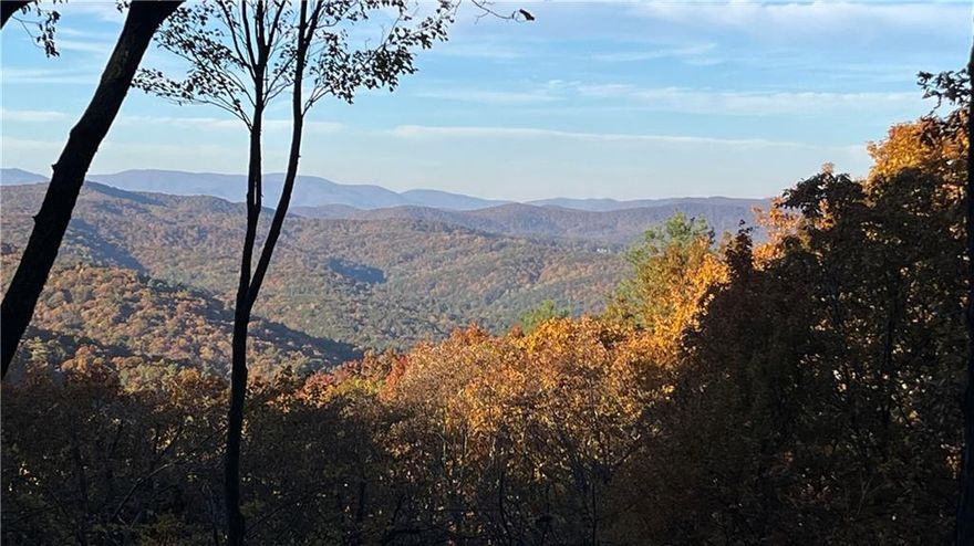 Pictures coming soon!! Enjoy breathtaking, long-range Blue Ridge Mountain views from this beautifully renovated multigenerational home in the luxury gated community of Big Canoe. Newly vista-pruned and professionally landscaped, this property offers exceptional privacy, curb appeal, and year-round scenery.

The main level features a wide open living space including a wood-burning stone fireplace, a wall of sliding glass doors, and tongue-and-groove ceilings that flood the home with natural light while framing the mountain vistas beyond. The spacious master suite is conveniently located on the main level, offering comfort, ease, and direct access to the breathtaking views.

This home has been upgraded with over $100,000 in improvements since its last purchase. Recent renovations include refinished hardwood floors throughout, new tongue-and-groove ceilings in the great room, and a fully updated kitchen with new countertops, backsplash, and modern appliances. The entire interior and exterior have been freshly painted, and the decking has been replaced with new screens for the screened-in porch. All bathrooms have been completely renovated with high-end finishes, and the lighting has been upgraded throughout the home. Additional improvements include new stone retaining walls, a repaved driveway, new carpet in the bedrooms, a newer roof, a new furnace, and a freshly repaired and cleaned septic system.

Designed for multigenerational living, the home offers two full living spaces, providing flexibility for extended family, guests, or a private retreat. Every detail has been thoughtfully updated to blend luxury, comfort, and functionality, creating a truly move-in-ready mountain home.

Nestled in Big Canoe’s premier gated community, you’ll enjoy access to world-class amenities including golf, lakes, hiking trails, fitness centers, dining, and more — all within a short drive from Atlanta.

Experience the perfect balance of mountain serenity and modern luxury in this completely renovated Big Canoe retreat.