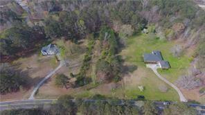Investment opportunity for 2.27 acres in one of the most wanted areas of Douglas County! This vacant land would be perfect for your new project. Located in ideal location with an average traffic count of over 6000 vehicles daily. Schedule a showing today.
Use GPS. Land is located between 4995 and 5017 Chapel Hill Rd, Douglasville GA
