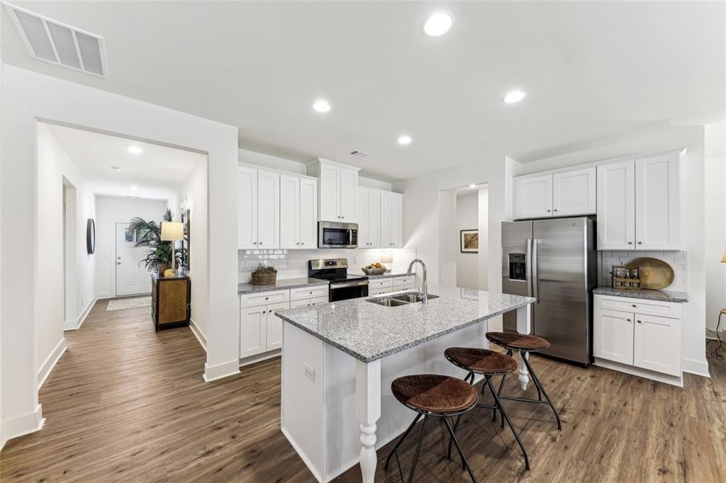 Offering 1 month FREE! Multiple floor plans available. Days on Market accrued is not specific to this current plan listed. Prices, promotions, and availability are subject to change. Contact the community beforehand directly and mention The Apartment Brothers.
If you’re looking for a slower pace of life, Calhoun-Gordon County is for you! Located almost exactly halfway between Atlanta and Chattanooga. With six exits off Interstate 75, our community offers travelers easy access to destination shopping, outdoor adventures, historical sites and celebrations, annual street fairs, arts and culture, and enough dining choices to satisfy most any palate. Two local theaters operate in the downtown district and a brand-new live music venue just opened on Wall Street. Music lovers can revel in the voice of Roland Hayes and tour a small museum celebrating his barrier-breaking career at the Harris Arts Center.
Civil War buffs travel to Calhoun area for the annual Battle of Resaca Reenactment in May, and throughout the year to visit the historic battlefields. Historians also enjoy touring New Echota and learning the history of the Cherokee Nation and its former capital.
North Pointe is offering new ranch style floor plans. With 3 beds, 2 bathrooms. In true Rocklyn style, and easy maintenance, homes feature LVP on the main floor. The owners’ bath features a shower with a tiled floor. North Pointe’s single-family homes are renting from the $1,600’s.
Join our VIP list to receive all the latest updates about North Pointe.