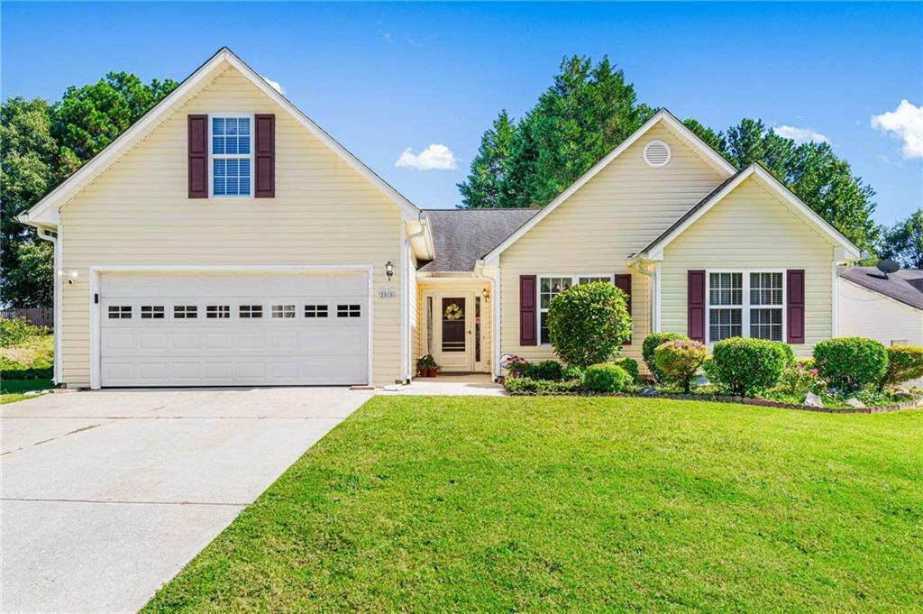 Step inside this charming home and you’ll immediately notice the warm, inviting spaces filled with natural light. The spacious family room, complete with a cozy fireplace and bright windows, flows into the dining area and updated kitchen featuring granite countertops, wood cabinetry, and plenty of room to gather. The primary suite offers a peaceful retreat with high ceilings and an en-suite bath, while additional bedrooms provide flexibility for family, guests, or a home office. Upstairs, a large bonus room with built-in storage creates the perfect space for a playroom, hobby area, or media room.
Outdoors, enjoy a covered back porch and extended deck, ideal for entertaining or simply relaxing while overlooking the private, fenced backyard. The property includes a storage shed and landscaped yard with space to garden, play, or unwind. With thoughtful details throughout and a convenient location close to shopping, dining, and schools, this home combines comfort and practicality — ready to welcome its next owners.