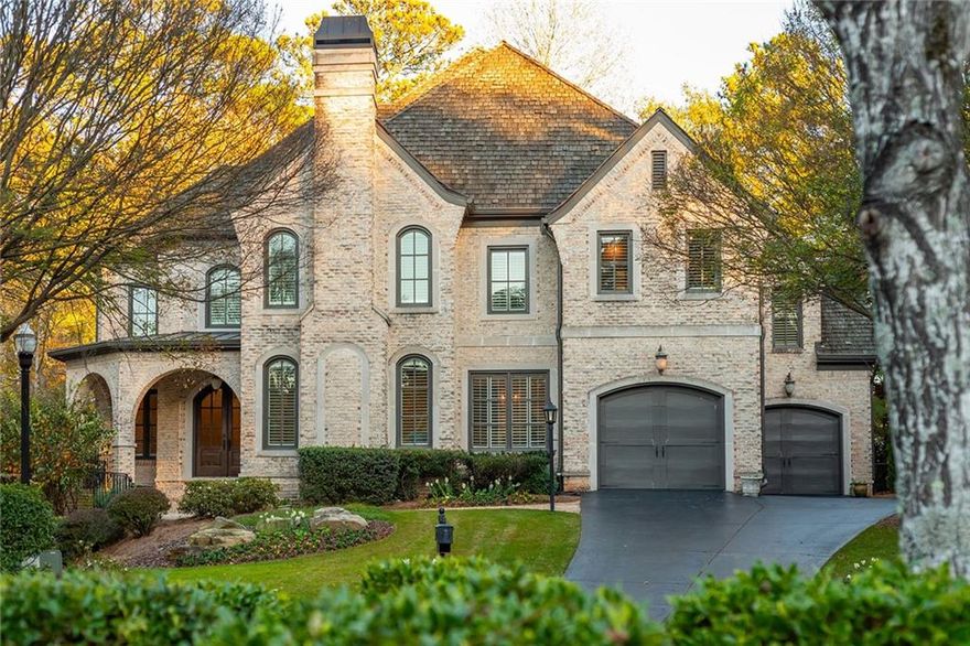 Welcome into this stunning, unique European style home in gated Ardsley Park. This unique and versatile layout is wonderful for quiet family gatherings and large entertainment. Primary on main with large hidden office, huge custom walk-in closet and renovated Primary bathroom including custom cabinetry, dual vanities, floor to ceiling tiled shower, marble floors, and stand alone tub. Gourmet kitchen includes high end appliances, large island, wine cooler, and ice maker. Off the kitchen is the large dinning room perfect for any size gathering. The living room with coffered ceilings is stunning, it has two sets of French doors on either side of the stone cast fireplace that leads out to a balcony. Off the living room through the brick archway, is the screened porch, the perfect place to relax. 10ft ceilings throughout the home. All 4 secondary bedrooms are oversized, have ensuite bathrooms, and walk-in closets. Also upstairs is a media or playroom, a craft room with a laundry shoot to laundry room on main level. The unfinished basement has 10ft+ ceilings is ready for you to make it your own. Hard-to-find quality craftsmanship throughout home. Beautiful landscaping in front and back w/ side dog yard.
