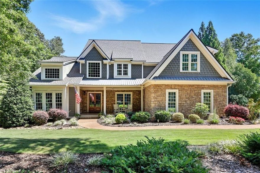 Nestled in Chestatee, a highly sought-after golf and boating community on Lake Lanier, this beautifully updated 5-bedroom, 5-bath home offers the perfect blend of serenity and sophistication. Tucked away on a quiet cul-de-sac, the property enjoys unique privacy in a peaceful, natural setting surrounded by mature trees, with the added convenience of a three-car garage. Inside, you’ll find light-filled living spaces, a thoughtfully designed floor plan, and tasteful updates throughout—including a new roof, refinished hardwood floors, and new windows. The main level features spacious gathering areas ideal for entertaining, while the screened porch invites you to relax and unwind as you overlook the tranquil landscape. The finished basement extends the living space with a media room, bar and game area, plus a guest suite with full bath—perfect for hosting family or friends. Enjoy the best of community living with neighborhood events throughout the year, and convenient access to shopping, dining, medical facilities, fitness centers, and hiking trails. Whether you’re seeking an active lifestyle or a quiet retreat, this vibrant Lake Lanier community offers it all.