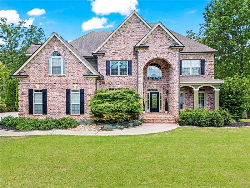 Exquisitely maintained traditional home on one of the best lots in the subdivision! High quality, custom construction and an entertainers dream. This 4 bedroom/5 1/2 bath home caters to a large family or small. Gleaming hardwood floors throughout the main level. Completely private fenced backyard that stretches past the fence. No neighbors within sight. Catch a quick catnap on either of the screened porches, off the main living area or master suite. Lots of work from home opportunities throughout, including the wide open spaces in the finished basement including a full sized bathroom or on the main level with an incredible wall of built-ins. No expense spared on the crown moldings and coffered ceilings. Sellers have taken great care of this home and it shows from the minute you walk thru the front door into the soaring 2 story entry. Definitely move in ready, you will not be disappointed!