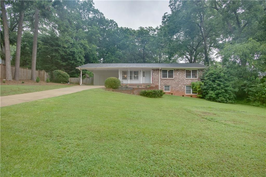 Charming Renovated Brick Home in Historic College Park. Welcome to this beautifully renovated brick home nestled in the heart of the sought-after Historic College Park community. Enjoy a spacious family room perfect for relaxing or entertaining, a well-appointed kitchen with abundant storage, and a separate dining area ideal for gatherings. Step outside to a stunning screened-in porch that overlooks a large, private, fenced backyard—your own peaceful retreat.
The generous owner's suite boasts a fully renovated en-suite bathroom. Two additional secondary bedrooms share an updated hall bath. The finished basement offers a versatile living area, an additional bedroom, and ample storage space. Conveniently located near all major Atlanta highways, Hartsfield-Jackson Airport, Delta, Porsche, Tyler Perry Studios, and Woodward Academy, this home combines comfort, charm, and an unbeatable location.
