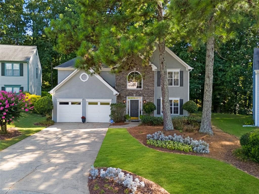 Welcome to this beautifully maintained, one-owner home that’s ready for its next chapter! Nestled in a friendly cul-de-sac, the home boasts a charming stacked stone and stucco exterior, with HardiPlank siding (2022), fresh exterior paint (2022), and new garage doors (2022) ensuring great curb appeal.
Step inside to find fresh interior paint throughout, durable LVP flooring on the main level, and brand-new carpet in the owner’s suite, upstairs hallway, and staircase. The spacious owner’s suite shines with a just-updated spa-like bathroom (July 2025), featuring new tile floors, quartz countertops, cabinets, mirrors, lighting, faucets, and a beautifully renovated shower.
Other recent updates include a new water heater (2023) and a freshly painted owner’s bedroom and closet. The open family room with soaring ceilings is perfect for entertaining, while the kitchen offers new quartz countertops and a window view of the serene backyard—a true retreat for bird lovers.
Conveniently located near Sprayberry High School, shopping, dining, gyms, and major highways, this home truly has it all. Don’t miss your chance to make it yours!