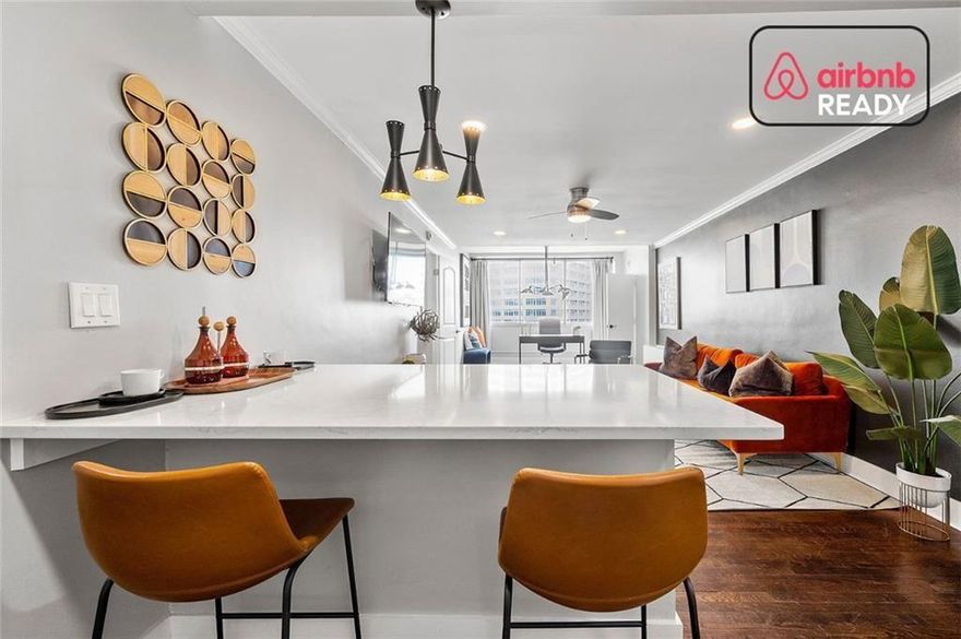Unbeatable price! Fully renovated and Airbnb-permitted, this stylish Downtown Atlanta condo is a true turnkey investment, sold COMPLETELY FURNISHED and ready to earn avg. of $50,000 in annual income. One of the few buildings in the city that allows short-term rentals, it is prepared to go with everything you need to start earning immediately. This is also a great investment for a pied-à-terre, a college student wanting to avoid increasing rent prices, or a right-sizer.
Inside, enjoy hardwood floors, designer lighting, an updated kitchen and bath with quartz countertops and stainless steel appliances, TWO bedrooms, an updated bathroom, and plenty of storage. The unit offers captivating city views and includes one assigned parking space, a rare find in the building. Landmark features a fitness center, central laundry facility, storage units 24-hour concierge, on-site management and swimming pool.
HOA dues cover all utilities, concierge, fitness center, pool, and security, keeping ownership effortless and predictable. Perfectly located near Mercedes-Benz Stadium, CNN Center, the Georgia Aquarium, GSU, MARTA, and the World of Coca-Cola, this property sits at the center of Atlanta’s growth with The Stitch, a transformative green space project, underway nearby.
Whether you’re a seasoned investor or first-time buyer, this is your chance to own an Airbnb goldmine in one of Atlanta’s few no-restriction buildings. All furnishings convey. Start earning the day you close and capitalize on the riches of the World Cup, America's Mart, concerts and sporting events.
Everything is included- TV's, furniture, linens, kitchenware, automated front door keypad/lock, etc.