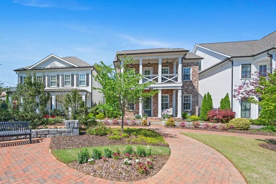 Welcome to this stunning home located in one of Alpharetta's most desirable and walkable communities! Nestled in the vibrant heart of downtown, this beautifully maintained property offers the perfect blend of charm, convenience, and modern comfort.  Step outside your front door and enjoy an effortless stroll to Alpharetta's best restaurants, boutique shopping, lively entertainment, and across from beautiful Brook street park. You're steps away from the Alpha Loop trail - perfect for walking or biking to Avalon.  Inside, you'll find an open and inviting floor plan filled with natural light, hardwood floors, and designer finishes.  The gourmet kitchen boast of stainless steel appliances, granite countertops, and a spacious island ideal for entertaining.  Relax in the cozy living room or enjoy evenings on one of the front porches or private side patio.  The primary suite is on the main level!!! It offers peaceful spa- like bath and a generous walk in closet.  Additional bedrooms are spacious and perfect for guest or a growing family.   You will also find a loft perfect for relaxing or an office.  This beautiful home comes with custom drapes, electric shades, and plantation shutters throughout.  With low-maintenance living and unbeatable access to everything Alpharetta has to offer, this home is truly a rare find.