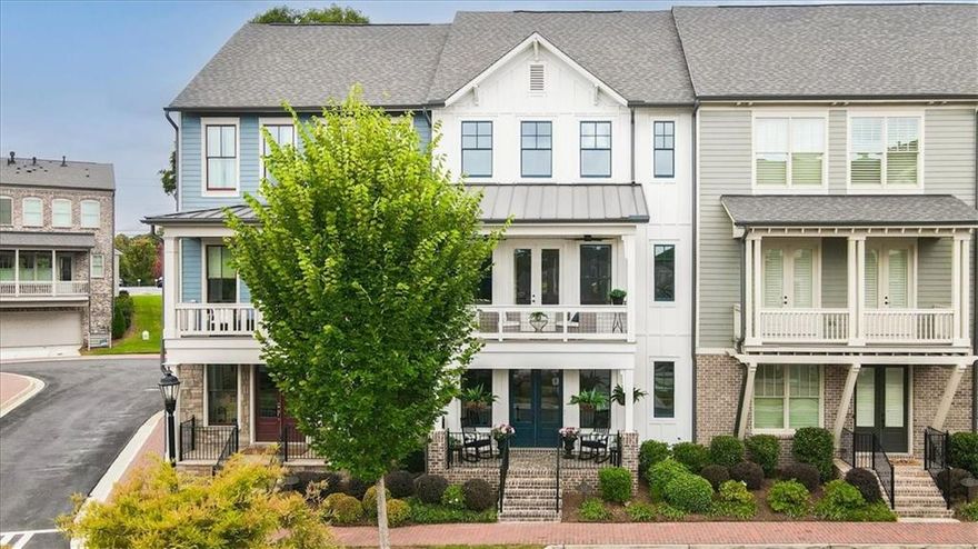 If location and better than new tops your list, Canopy is as good as it gets — a boutique community perfectly tucked between Roswell Mill, Canton Street, and the Chattahoochee River. Surrounded by parks, trails, and local hotspots, this model home stands out with double front porches, designer finishes, and luxury upgrades throughout. Step through the double front doors into a light-filled open plan with hardwood floors, custom lighting, and so many upgrades throughout. The gourmet kitchen boasts quartz countertops, abundant cabinetry, and top-tier stainless appliances, flowing seamlessly into the spacious dining and living areas with fireplace and shiplap accents. Enjoy indoor-outdoor living at its best with a front balcony overlooking the community and a covered back deck with privacy curtains. The corner office with windows—an inspiring work-from-home retreat. Upstairs, the primary suite features a large walk-in closet and a spa-inspired bath with double vanities and an oversized shower. Two generous secondary bedrooms provide comfortable space for guests.
The laundry has also been upgraded with extra cabinets, quartz countertops and sink. 
The terrace level is bright and inviting, finished to the same high standards as the main level and complete with a full bath—perfect for a media room, gym, or guest suite. Community perks include a dog park and an overlook park with river views. From here, you can walk to Gate City Brewing, Mac McGee’s, and all the charm of Historic Downtown Roswell. Experience upscale living with a lock-and-leave ease, where every detail blends comfort, convenience, and style.
Canopy isn’t just a neighborhood — it’s a lifestyle.