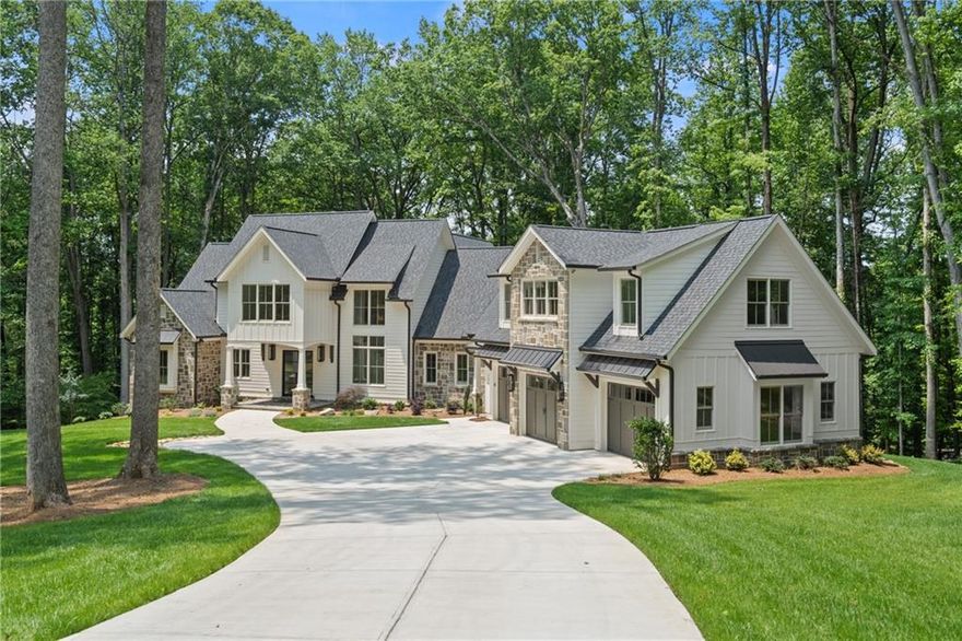 Timeless, French-Country Estate new construction with 5 bedrooms and 5 1/2 baths. Nestled beneath 3.10 acres of majestic hardwoods and overlooking lush North Fulton farm land in the coveted area of Milton, GA horse country. Both the owners' suite and a guest suite are located on the main level with private access to the guest suite. Gourmet kitchen with Thermador appliances, a walk-in pantry and prep-kitchen. Custom handcrafted beams run throughout the living area. Enjoy your private rear porch with stone fireplace and tile floors overlooking a level backyard. There is a full daylight basement and attached 3 car garage with room for additional storage. Rare private lot, located at the end of a cul-de-sac in a well established Milton luxury community, Hickory Crest Subdivision.  Excellent pool lot. You are only a stones throw away from the fabulous Union Hill Grill, 7 Acres BarNGrill and Publix shopping center. Please GPS Hickory Pass , Alpharetta/Milton, Georgia 30004 (without the street number) for driving instructions. GPS with the street number will likely direct you through the woods instead of the street/driveway.