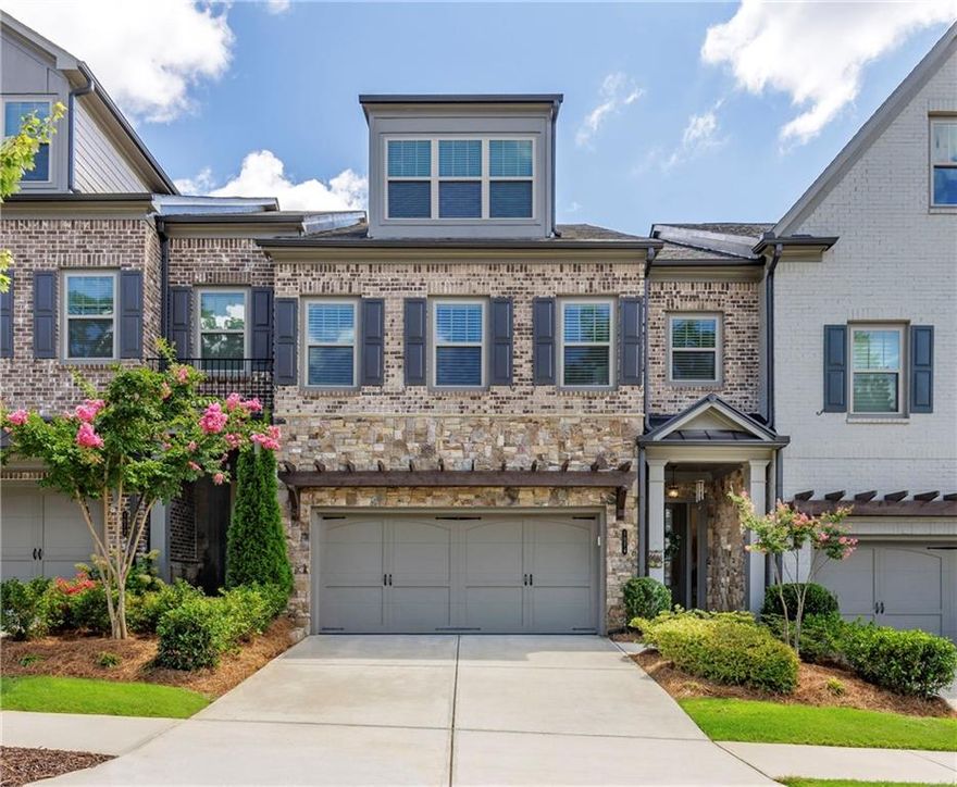 The fantastic combination of ample space, updated finishes, community amenities and location makes this beautiful townhome the most compelling value in Alpharetta!  3 nicely finished floors with over 3,600 sq ft (all above grade) and the 2-car garage located on the main level, which has high ceilings and an open floorplan.  Elevator ready with 3 additional large closets that provide tons of storage space. The 2nd floor has 3 bedrooms, including the master suite with a sitting room and direct access to the laundry from the master closet. The 3rd floor has another bedroom and a huge recreation room that provides a variety of options.  You’ll love the amenities in Harlow with 2 pools, clubhouse, tennis courts, walking trails, dog park and lots of level lawn space. You can’t beat the short drive to the active portions of Alpharetta & Roswell, easy access to GA400, and a quick walk to enjoy concerts at Ameris Bank Amphitheatre without the hassle of parking.  Harlow East is one of the most sought-after communities in North Fulton because of its spacious & updated townhomes, sociable amenities, excellent schools and ideal location!