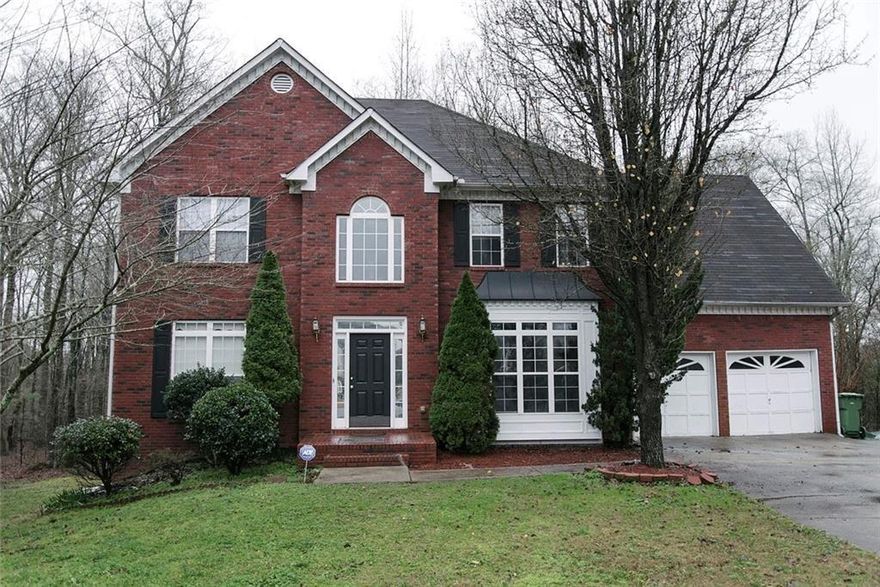 VERY MOTIVATED!!! Tenant occupied. ***EVICTION IN PROGRESS*** No sign posted. This stunning 2-story brick front home is the epitome of modern comfort and elegance. The fully finished basement in-law suite/apartment features two bedrooms, full kitchen, full bathroom and family room area. Great rental income possibility. This property is a rare find, blending traditional charm with trendy updates, which makes this property an ideal haven for those seeking privacy, comfort and easy accessibility to shopping, schools and entertainment. Enjoy the convenience of close proximity to Kennesaw Mountain National Park, The Marietta Square, The Avenues of West Cobb and The Battery Atlanta.