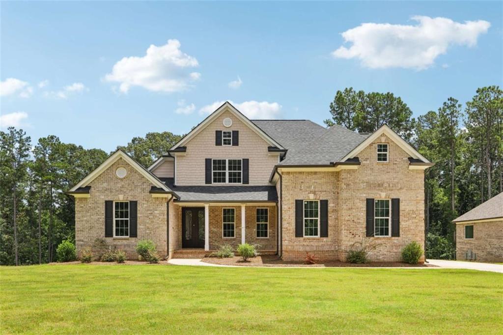 Special Financing Available Lock in a fixed 4.99 % interest rate with preferred lenders or receive up to $15,000 in builder incentives, with additional savings available through our preferred lender network. The Hedgegrow III Plan offers 4 bedrooms, 3.5 baths, a spacious bonus room that can become a 5th bedroom, and an approximately 2,000 square foot unfinished basement stubbed for plumbing. The open layout features hardwood floors, a two story family room with a gas fireplace, and a gourmet kitchen with solid stone countertops, 42 inch cabinets, and stainless steel appliances. The main level primary suite features vaulted ceilings with double fans, hardwood flooring, a spa style bath, and a walk in closet. Upstairs includes 3 additional bedrooms, 2 full baths, and a flexible bonus room. Enjoy the covered back deck with stairs and a leveled backyard, ideal for relaxing or entertaining. The best part is still yours. Interior selections are open so you can pick the finishes that match your style and vision. Located in a swim and tennis community with clubhouse and playground just 20 minutes from Interstate 20, and close to shopping, Atlanta, and the airport. Built by Hadi Builders, Douglasville's trusted local custom homebuilder.
