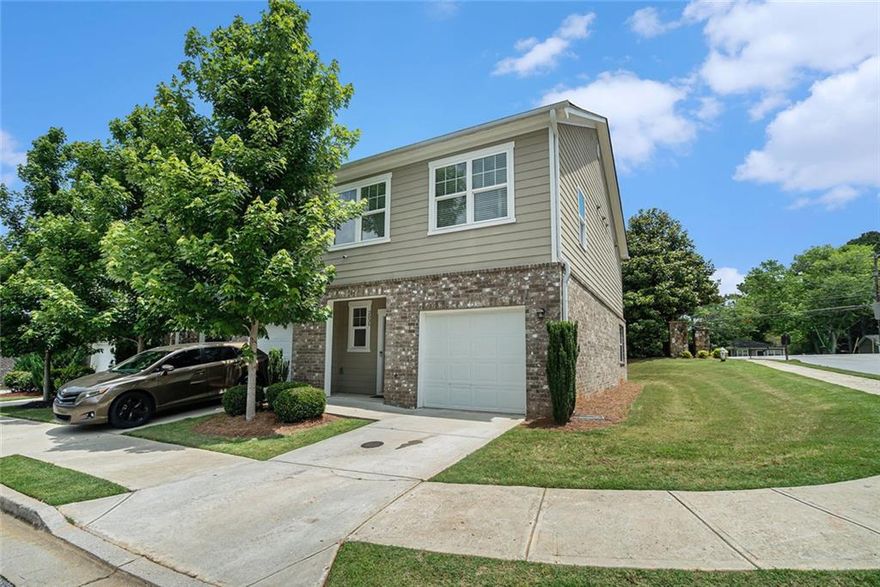 Nestled in a picturesque and sought-after neighborhood, this stunning 3-bedroom, 2.5-bath end-unit townhome is the perfect blend of comfort, style, and convenience. From the moment you arrive, you'll be captivated by its ideal corner-lot location, offering one of the largest yards in the entire neighborhood-a rare find that provides both space and privacy in a low-maintenance setting. The open floor plan creates an effortless flow between the living, dining, and kitchen areas, making it perfect for entertaining guests or simply enjoying peaceful evenings at home. The main level is adorned with luxury vinyl plank flooring, offering durability and a warm, inviting feel that complements any style. In the living room, you'll be drawn to the custom accent wall, a designer touch that adds depth, personality, and a dash of drama to the space. The kitchen is a chef's delight with gleaming stainless steel appliances, sleek cabinetry, and plenty of counter space for meal prepping or baking your favorite treats. A conveniently located powder room on the main level adds to the thoughtful design. Upstairs, retreat to your generous-sized owner's suite, a true sanctuary with ample space for a king bed and a cozy reading nook. The ensuite bath features modern fixtures and a soothing atmosphere-ideal for unwinding at the end of the day. Two additional bedrooms offer versatility-perfect for guests, a home office, or a stylish nursery-along with a second full bathroom to ensure comfort for all. The 1-car garage provides secure parking and additional storage, and with low-maintenance living, you'll spend less time on chores and more time enjoying all this vibrant neighborhood has to offer. Whether it's morning coffee in your yard, evening strolls through the community, or weekend gatherings with loved ones, this home is more than just a place to live-it's where your story begins.