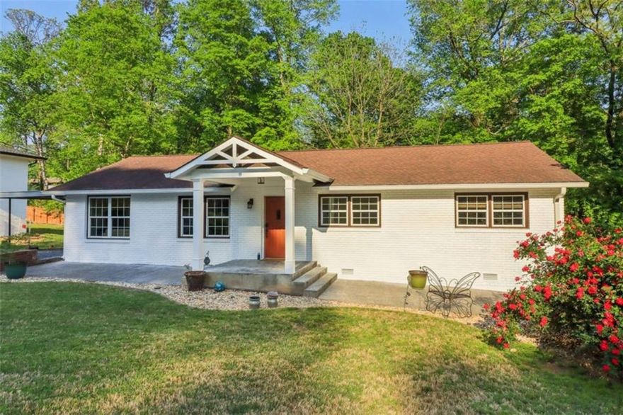 Beautifully renovated 3-bedroom, 2-bath home located in the heart of Marietta, just minutes from Truist Park, The Battery, Cumberland Mall, and quick access to I-75/I-285. This charming home features fresh interior and exterior paint, refinished hardwood floors, and thoughtful updates throughout. The kitchen opens to a cozy dining area and living space, ideal for everyday living and entertaining. One of the bedrooms includes a custom Murphy bed, perfect for guests or a home office. The spacious garage offers a built-in workspace and an electric car charger. Enjoy the outdoors with a screened-in back porch, fire pit area, and a beautifully landscaped backyard. Additional features include a covered carport, storage shed, and ample parking. This move-in ready home combines modern convenience with comfort in a prime Cobb County location.