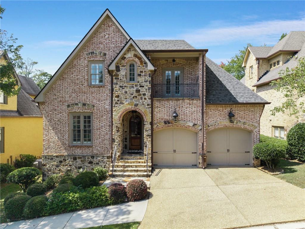 Nestled in the prestigious Buckhead Valley within the sought-after Brookhaven/Pine Hills area, this Harrison-designed residence showcases exquisite craftsmanship and timeless elegance, featuring Brazilian hardwood floors throughout the main level, solid wood doors, a heavy trim package, and designer touches enhanced by custom built-ins and detailed millwork, with an elevator shaft ready for future accessibility. The main level offers a separate dining room with a coffered ceiling, a fireside family room with built-ins, and a chef’s kitchen complete with double ovens, gas cooktop, stainless steel appliances, stained cabinetry, a breakfast bar, and a sunny breakfast room, along with a study or optional bedroom with full bath, and a screened-in porch overlooking the newly landscaped backyard. Upstairs, the luxurious owner’s suite boasts a private stone balcony with spectacular views, spa bath with jacuzzi tub, separate shower, granite countertops, and dual closets, accompanied by two additional spacious bedrooms with walk in closets sharing a Jack-and-Jill bath. The full finished daylight terrace level is an entertainer’s dream, featuring a custom bar, recreation and media rooms, a bedroom with full bath, ample storage, and walkout access to a covered patio and private yard. Additional updates include a newer roof, HVAC systems, and water heater, providing peace of mind and efficiency. Perfectly situated near major thoroughfares, Buckhead, Brookhaven, CHOA, Emory, and the CDC, this stunning home offers both convenience and sophistication.