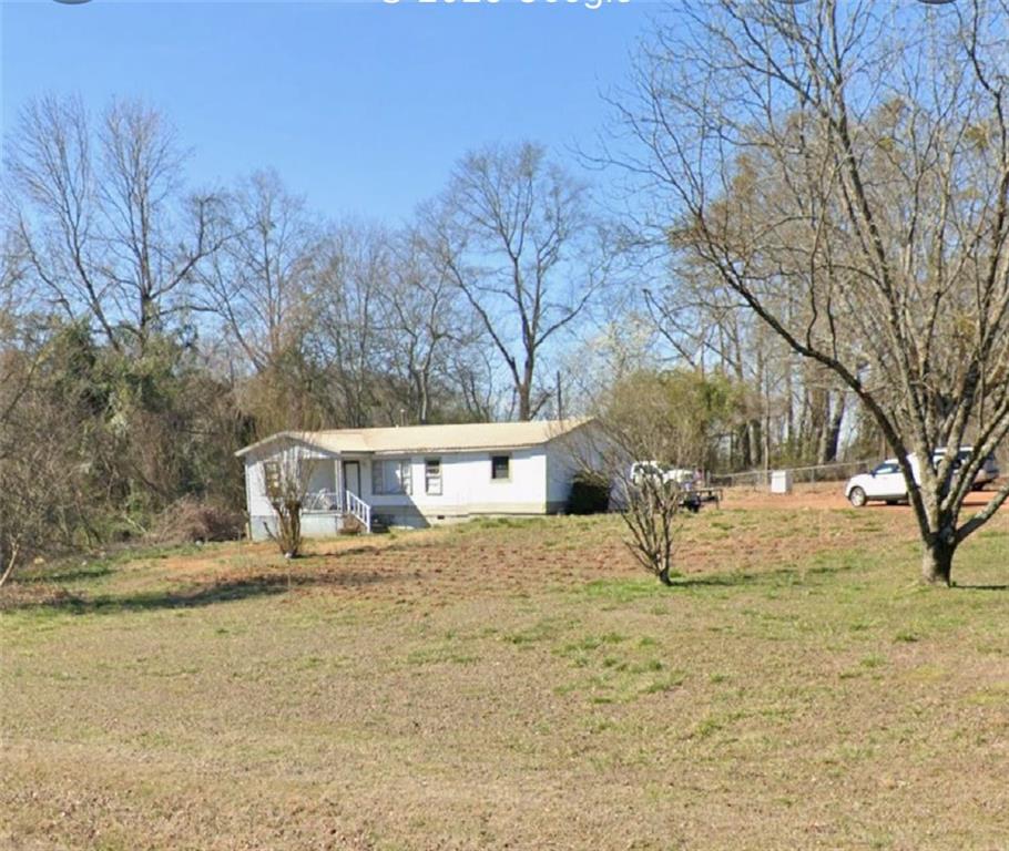 Welcome to 37 Carruth Road in charming Jefferson, GA! This well-cared-for 3-bedroom, 1-bath ranch offers the perfect blend of comfort, space, and opportunity. Sitting on a generous 1.37-acre lot, this property is move-in ready with room for TLC to personalize and make it your dream home.
Inside, you’ll find a functional layout with a spacious living area, cozy kitchen, and plenty of natural light.
Enjoy the expansive, level lot—perfect for outdoor living, entertaining, or expansion. With 1.37 acres of usable land, this property also presents a fantastic opportunity for builders or investors looking to subdivide and develop new homes (subject to zoning approval).
Located in the desirable Jefferson City School District and just minutes from shopping, dining, parks, and I-85 access. Whether you're looking for a forever home or your next investment project, this one has the potential to deliver!