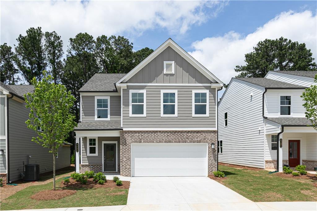 Welcome to Kinglsey at Lake Allatoona, the new Stanley Martin Community in Acworth, GA! LOT 41. Ask about the AMAZING builder Incentives available closing cost & builder buy down rates available on select homes!
In the New Construction Tyndall floorplan, you can mix and mingle with friends and family in your open-concept first floor, which includes a kitchen overlooking the family room and dining area and pocket office. The covered front porch or rear patio provide the perfect spot to relax and enjoy your new home.
Upstairs, the Primary suite boasts ample space, including a large walk-in closet off the on-suite bathroom with double vanities, walk-in shower and separate soaking tub. Additional bedrooms provide the perfect place for family or friends to rest their heads at night. Plus, take the chore out of doing the laundry with a conveniently located laundry room on the upper level!
Some of the SMart Selected design options in this home include a gourmet kitchen & center island, large owner's suite with walk-in closet and on-suite bath, patio, main level bedroom and full bath.