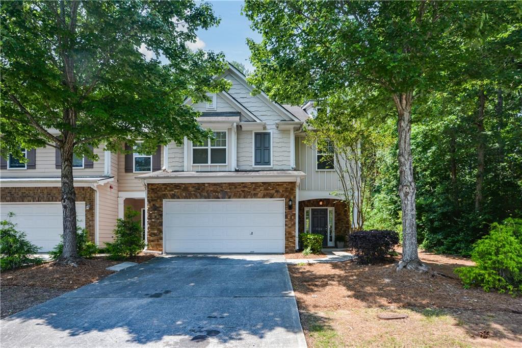 End Unit ** PREMIUM LOT ** in highly sought after Mountain Brook community. Stunning mountain views as you approach. All you see is green outside of every window. This bright happy home backs up to the nature preserve. Not your typical townhome experience. Largest floorplan in the community with an upstairs loft. This flex space could be used for an office, home gym, additional media space, playroom, etc. Buyers can hike for miles on the Nature Trail right outside their front door. Walk over to the community lake for a relaxing afternoon outing. This home is truly move-in ready. Buyers will enjoy the large kitchen with updated appliances and granite counters. Don't miss all of the custom closets throughout the home. Luxury vinyl plank flooring throughout most of the house. The location of this unit, close to overflow parking and amenities, make it a perfect 10!