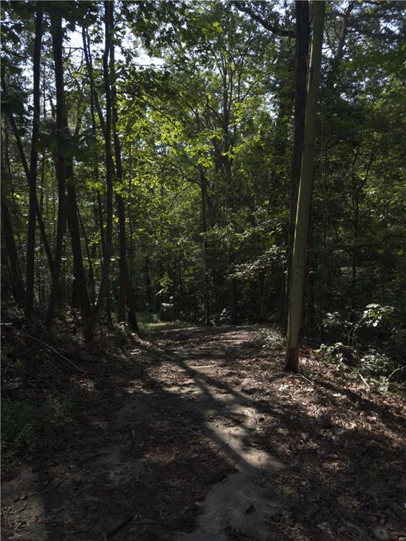 Don't miss this opportunity! Discover the perfect opportunity to build your dream home on this spacious, private and wooded lot situated in a peaceful area of Hall County, this property offers privacy, natural surroundings, and excellent potential for development.
The lot offers a natural landscape with mature trees and a gentle topography, ideal for a custom residence, vacation retreat, or investment property. With its generous dimensions and privacy, you will have plenty of flexibility for home placement, outdoor living, or future improvements.
Conveniently situated near Lake Lanier, schools, shopping, and major highways, this parcel combines the serenity of a residential neighborhood with quick access to Gainesville’s amenities.
Utility and septic system records can be confirmed with Hall County. Survey is already in place.