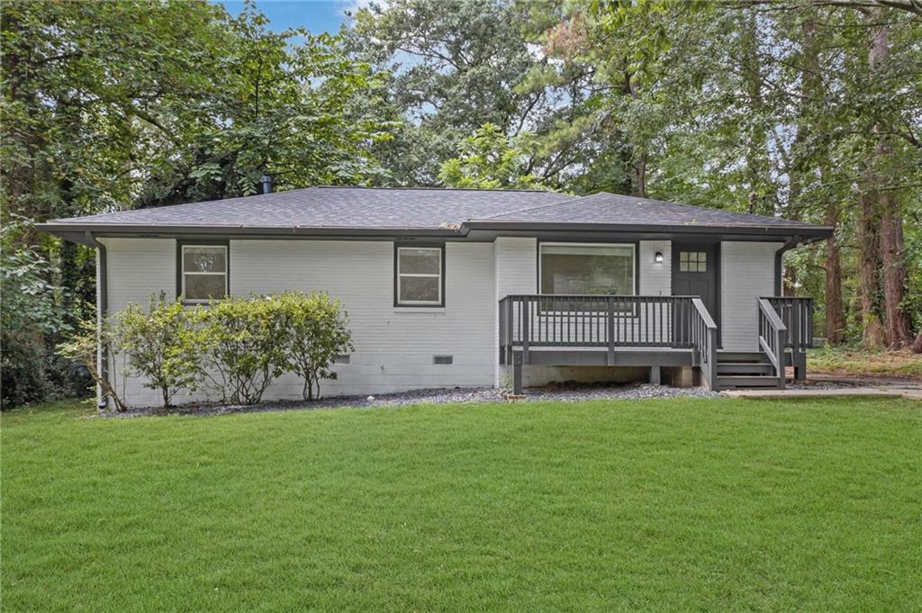 Special Financing Options Available - Welcome to 3531 Tulip — a beautifully renovated, high-end residence nestled on a beautiful lot in the charming Meadowdale neighborhood of Belvedere Park in Decatur. This turnkey home has been meticulously transformed inside and out, offering a modern, move-in-ready retreat for homeowners or an excellent opportunity for investors seeking strong rental income potential. From the outside you are amazed with a contemporary look with clean lines and a gorgeous new oversized wooden gable bracket. Step inside to an inviting open-concept layout filled with natural light and elevated finishes throughout. The home features brand-new light wood-tone flooring, quartz countertops, stainless steel appliances, recessed lighting, and stylish bathroom vanities. The primary en-suite bath boasts an impeccably designed walk-in shower, creating a true spa-like experience. The secondary bathroom includes a shower/tub combo and new double vanity. Thoughtfully designed, the floor plan includes a spacious living area and large kitchen area perfect for entertaining, a laundry room and three generously sized bedrooms. The private primary suite, located at the back of the home, offers tranquil views of the large serene back yard. The laundry area has tons of space as well ready for your personal touches. Enjoy outdoor living on the expansive back deck — perfect for grilling, relaxing with your favorite beverage, or gathering with friends and family. Additional highlights include: Appliance package to be installed prior to closing (appliances pre-selected but negotiable) and new HVAC system. Easy access to I-285, I-20, Glenwood Ave, Memorial Drive, and Downtown Atlanta. Less than 10 minutes to Indian Creek MARTA station with parking, just 10 minutes to East Lake Golf Club and 20 minutes to Hartsfield-Jackson International Airport. Qualified buyers may be eligible for $0 down payment with no PMI or $7,500 in closing cost grants - for first-time buyers (no homeownership in the past 3 years). Don’t miss this rare opportunity to own a beautifully finished home in one of Decatur’s most convenient neighborhoods. Investors - This can be purchased as a portfolio along with additional properties.