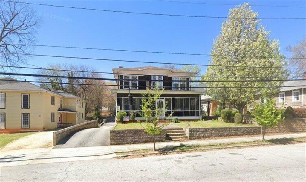Discover the charm and potential of this historic 1920 home at 1008 State St NW, ideally located just minutes from Atlantic Station, Georgia Tech, the Georgia Aquarium, World of Coca-Cola, and Mercedes-Benz Stadium. This spacious property features four fireplaces, bedrooms on every level, a full basement, and outdoor living spaces, including a covered patio and a deck off the kitchen. With its character-filled design and prime location, this fixer-upper offers endless possibilities—restore it to its historic beauty, create your dream residence, or transform it into an income-producing rental perfect for students or shared living. Close to some of Atlanta’s best shopping, dining, and hospitals, this home is truly a rare find in the heart of the city. This property will not last!
