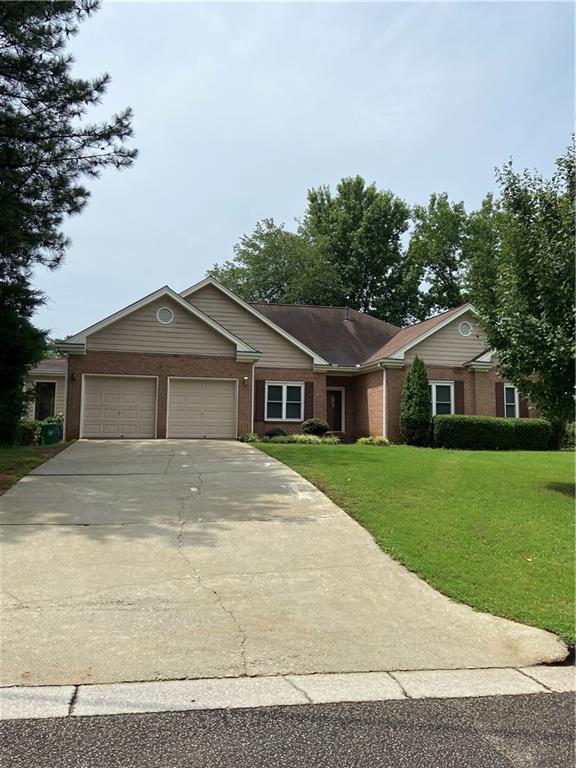 Custom Brick Ranch. Home offers 2 Owner's Suites, each with a large walk-in closet and one has a Jack-n-Jill Bathroom that can be shared by the 3rd Bedroom. This home features an OPEN FLOOR PLAN, great for entertaining. A Huge Living Room with Fireplace opens to both an open Separate Large Dining Room as well as the Kitchen. A Spacious Breakfast Area with a Bay Window that overlooks a view of the Lake. NEWLY RENOVATED OVERSIZED KITCHEN complete with new Granite Countertops and Stainless-Steel Appliances. The new Range has both a Tradition and Convection Oven feature. The Kitchen Floor is Hardwood. There is a Mud Room/Office with Stereo System. A half Bathroom is in the middle of the Home. A spacious Laundry Room. Walking out to the Screened Porch with a Pet Door and a Private Lake View is a tranquil setting to your private Oasis at the end of the day. There is a Two-Car Garage that leads into the Kitchen. A Must See!!!