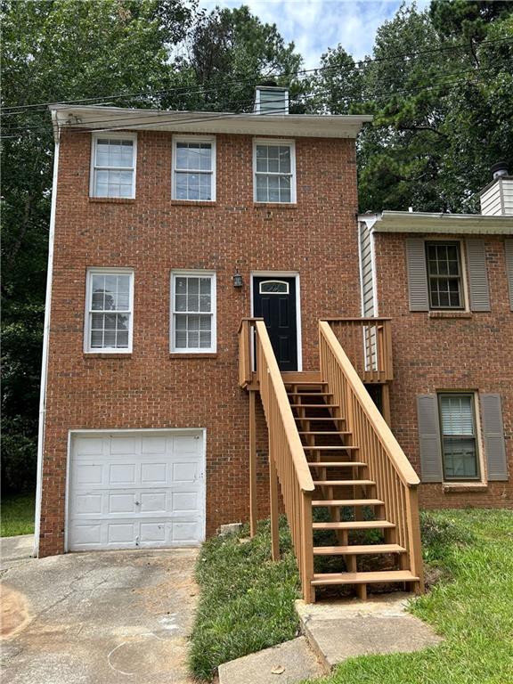 Newly remodeled townhome. Three finished levels. Spacious open and bright. New kitchen and new paint throughout. Two large bedrooms and two full baths on top floor and two more rooms with living area and full bath in finished basement area. Fireplace in living room. Large back deck. Great location close to Smyrna and Marietta. Vacant.
